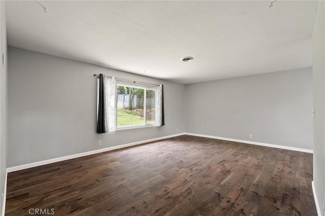 2880 Foothill Blvd, Oroville, CA 95966 - unfurnished room featuring dark wood finished floors and baseboards