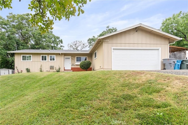 2880 Foothill Blvd, Oroville, CA 95966 - ranch-style house with a front yard, an attached garage, and driveway