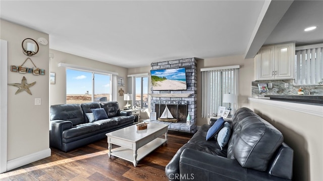 402 E Oceanfront, Newport Beach, CA 92661 - living area featuring a stone fireplace, wood finished floors, baseboards, and recessed lighting