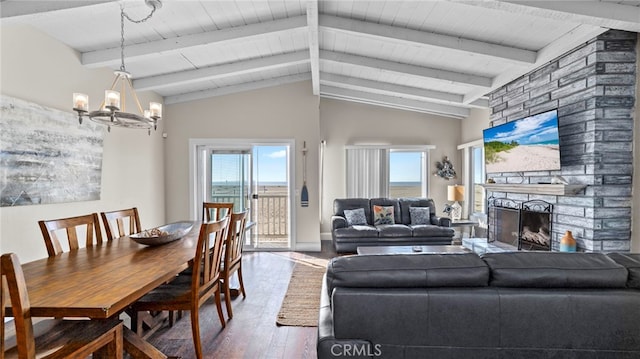402 E Oceanfront, Newport Beach, CA 92661 - living room with wood finished floors, a chandelier, a fireplace, healthy amount of natural light, and wood ceiling