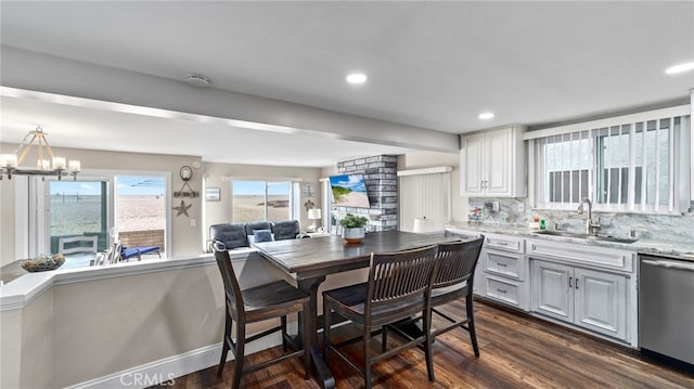 402 E Oceanfront, Newport Beach, CA 92661 - kitchen featuring stainless steel dishwasher, a sink, dark wood finished floors, a chandelier, and recessed lighting