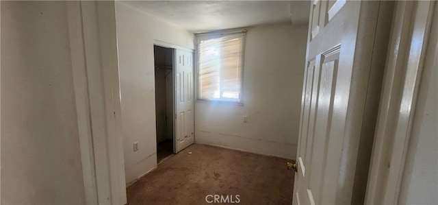 7067 Tamarisk Ave, Yucca Valley, CA 92284 - unfurnished bedroom featuring a closet