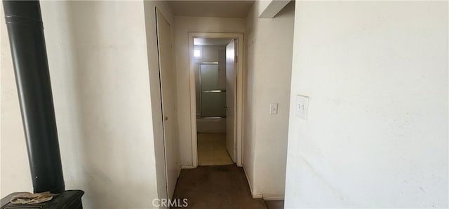 7067 Tamarisk Ave, Yucca Valley, CA 92284 - hallway with dark colored carpet