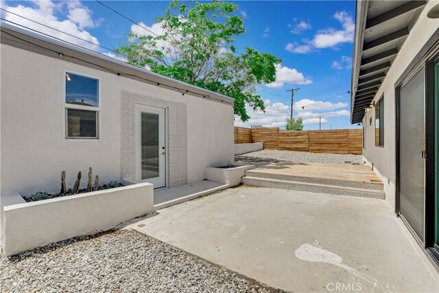 61461 El Reposo St, Joshua Tree, CA 92252 - view of patio / terrace with a fenced backyard