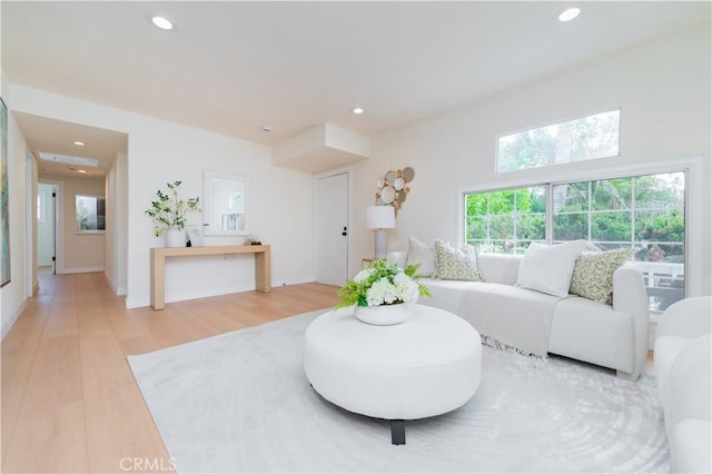 living room featuring recessed lighting and light wood-style flooring