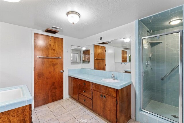 300 Pioneer Rd, Lake Arrowhead, CA 92352 - bathroom with vanity, a stall shower, and tile patterned flooring