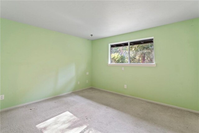 300 Pioneer Rd, Lake Arrowhead, CA 92352 - spare room featuring carpet flooring and baseboards