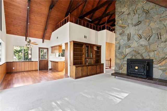 300 Pioneer Rd, Lake Arrowhead, CA 92352 - unfurnished living room featuring wood ceiling, high vaulted ceiling, wood finished floors, beam ceiling, and ceiling fan
