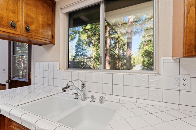 300 Pioneer Rd, Lake Arrowhead, CA 92352 - kitchen view of brown cabinets and tile counters