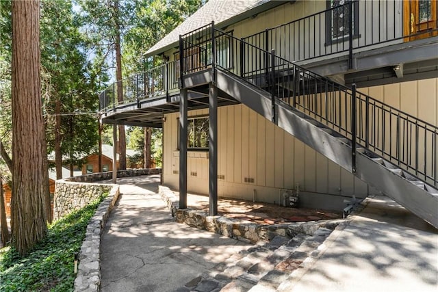 300 Pioneer Rd, Lake Arrowhead, CA 92352 - view of side of property featuring stairway and roof with shingles