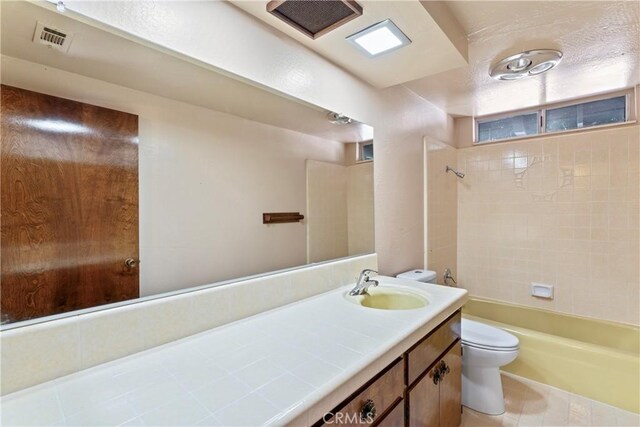 300 Pioneer Rd, Lake Arrowhead, CA 92352 - full bathroom featuring toilet, vanity, tile patterned floors, and bathtub / shower combination