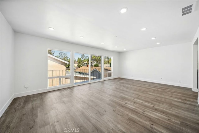 22713 Islamare, Lake Forest, CA 92630 - unfurnished room featuring baseboards, wood finished floors, and recessed lighting