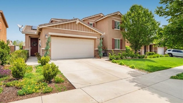 craftsman inspired home with a garage, solar panels, driveway, a front lawn, and stucco siding