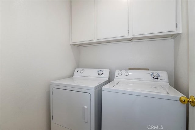 4102 Victoria Ln, Quartz Hill, CA 93536 - laundry area featuring washer and dryer and cabinet space