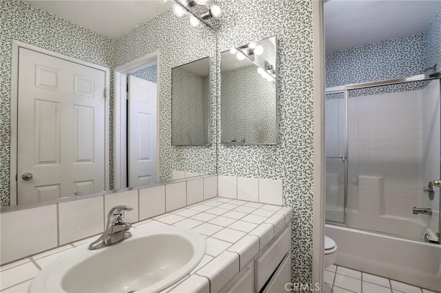 4102 Victoria Ln, Quartz Hill, CA 93536 - full bath with combined bath / shower with glass door, vanity, tile patterned flooring, and wallpapered walls