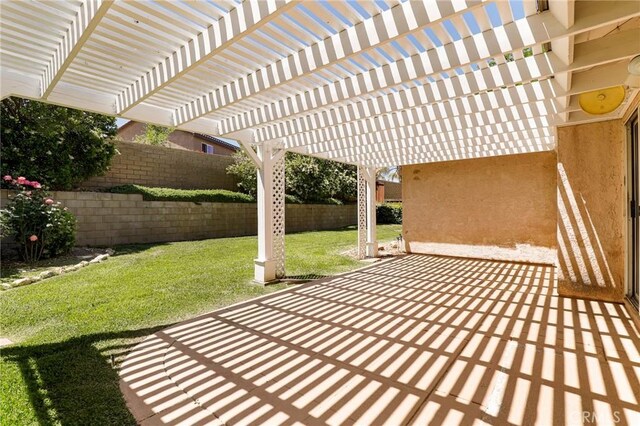 4102 Victoria Ln, Quartz Hill, CA 93536 - fenced backyard with a patio and a pergola
