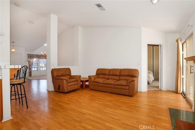 4102 Victoria Ln, Quartz Hill, CA 93536 - living area featuring light wood finished floors and high vaulted ceiling