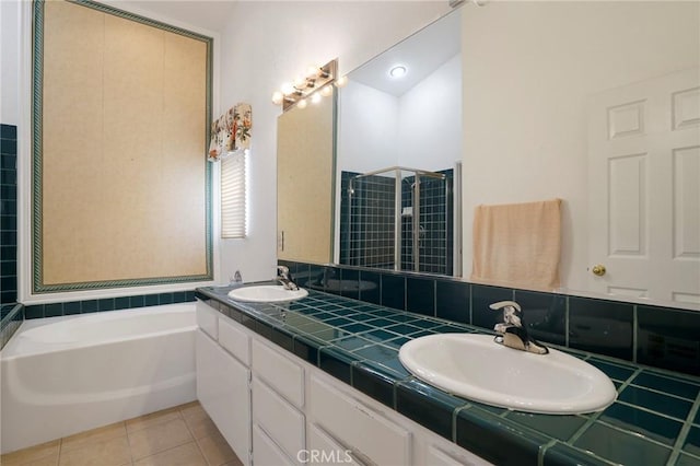 4102 Victoria Ln, Quartz Hill, CA 93536 - bathroom with double vanity, a bath, tile patterned flooring, and a stall shower