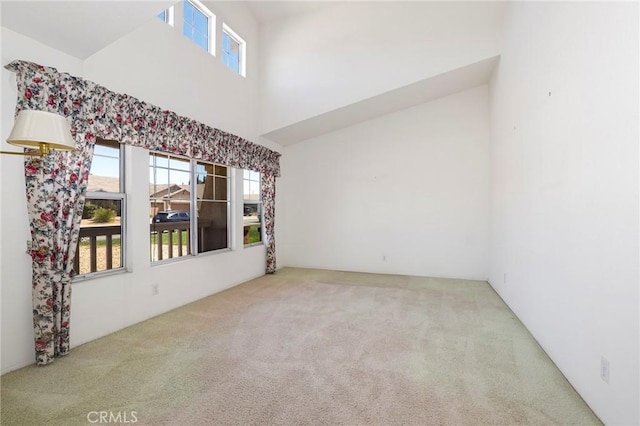 4102 Victoria Ln, Quartz Hill, CA 93536 - empty room with carpet floors, healthy amount of natural light, and a high ceiling