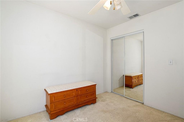 4102 Victoria Ln, Quartz Hill, CA 93536 - bedroom featuring light colored carpet, a closet, and ceiling fan