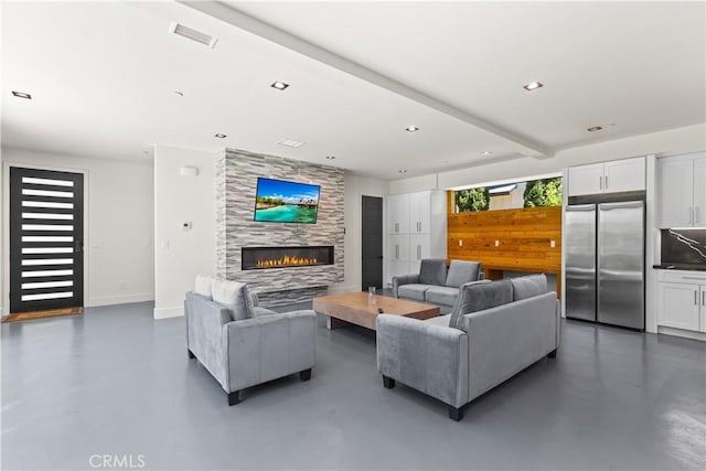 1021 Teakwood Dr, Lake Arrowhead, CA 92352 - living room featuring finished concrete flooring, a fireplace, baseboards, recessed lighting, and beam ceiling