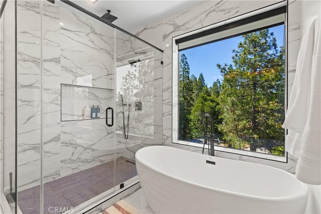 1021 Teakwood Dr, Lake Arrowhead, CA 92352 - bathroom with a marble finish shower, a soaking tub, and healthy amount of natural light
