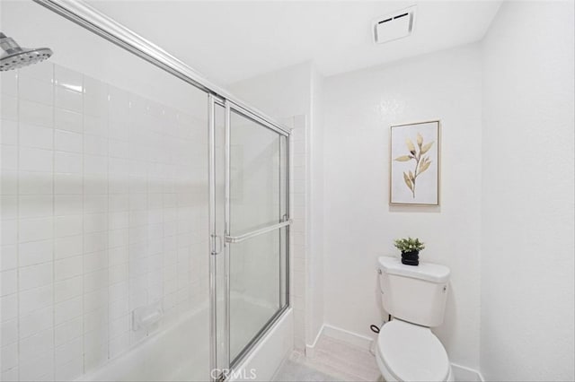 23721 Via Segovia, Murrieta, CA 92562 - full bathroom featuring baseboards, enclosed tub / shower combo, and toilet