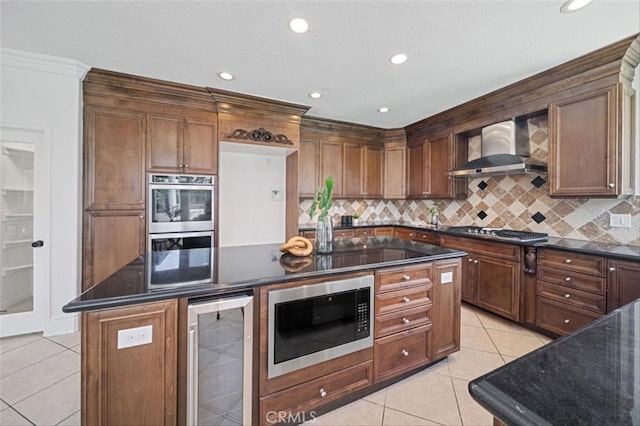 23721 Via Segovia, Murrieta, CA 92562 - kitchen featuring wall chimney exhaust hood, beverage cooler, appliances with stainless steel finishes, light tile patterned flooring, and backsplash