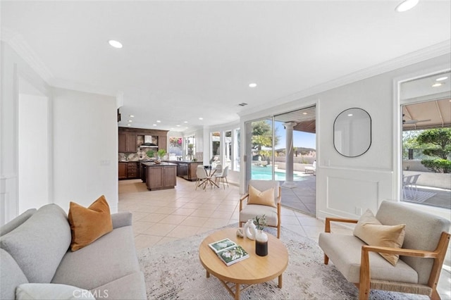 23721 Via Segovia, Murrieta, CA 92562 - living area with recessed lighting, ornamental molding, light tile patterned floors, and healthy amount of natural light