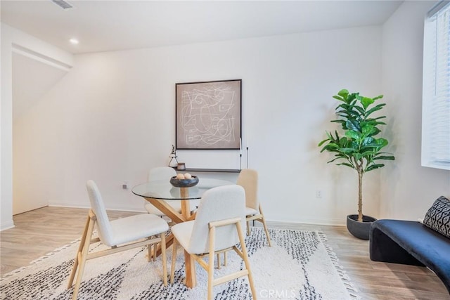 1609 Fig Tree Way, Oceanside, CA 92056 - dining space with wood finished floors, baseboards, and recessed lighting