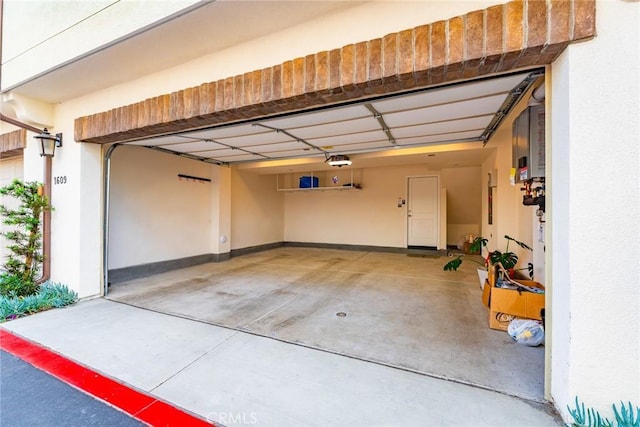 1609 Fig Tree Way, Oceanside, CA 92056 - garage featuring a garage door opener