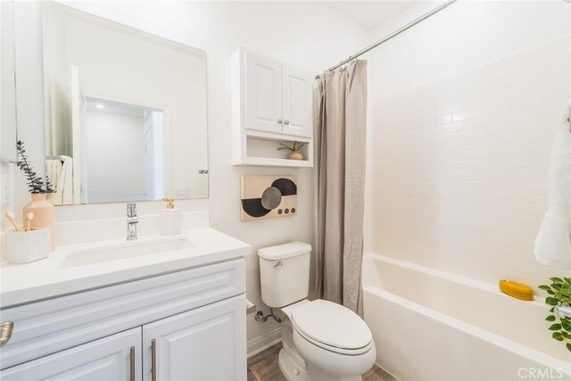1609 Fig Tree Way, Oceanside, CA 92056 - bathroom with toilet, vanity, and shower / bathtub combination with curtain