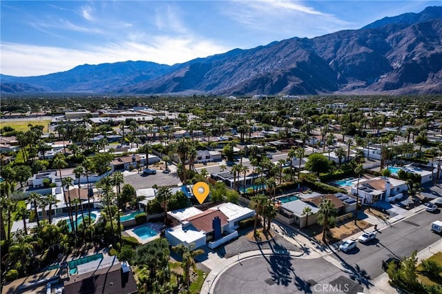 1123 E El Cid E, El Cid, Palm Springs, CA 92262 - aerial perspective of suburban area featuring a mountain backdrop