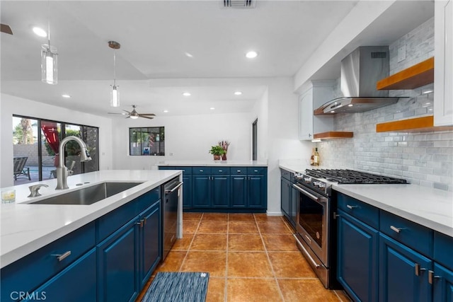 1123 E El Cid E, El Cid, Palm Springs, CA 92262 - kitchen with appliances with stainless steel finishes, a sink, blue cabinets, open shelves, and recessed lighting