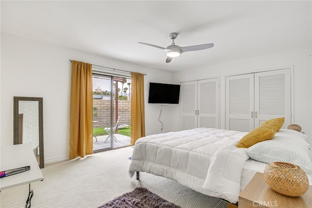 1123 E El Cid E, El Cid, Palm Springs, CA 92262 - bedroom featuring access to exterior, carpet, multiple closets, ceiling fan, and baseboards
