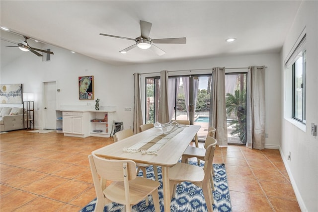1123 E El Cid E, El Cid, Palm Springs, CA 92262 - dining area with ceiling fan, healthy amount of natural light, light tile patterned flooring, vaulted ceiling, and recessed lighting