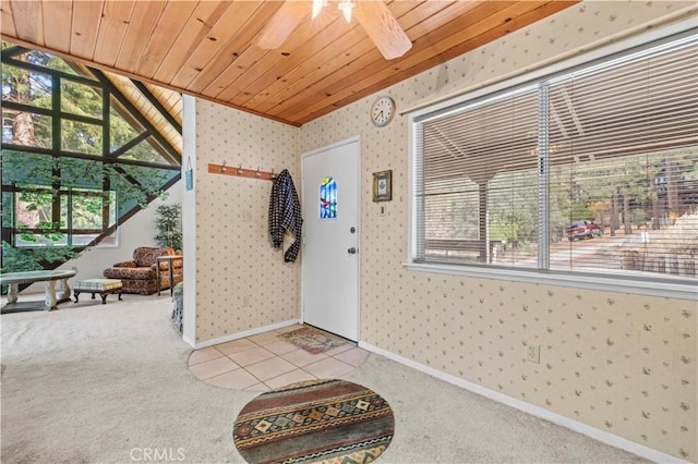 1513 Bernina Dr, Pine Mountain Club, CA 93222 - entrance foyer featuring wallpapered walls, carpet flooring, wood ceiling, baseboards, and tile patterned floors