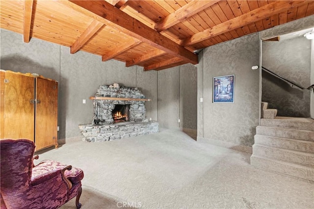 1513 Bernina Dr, Pine Mountain Club, CA 93222 - living area featuring wooden ceiling, beam ceiling, carpet floors, stairs, and a stone fireplace
