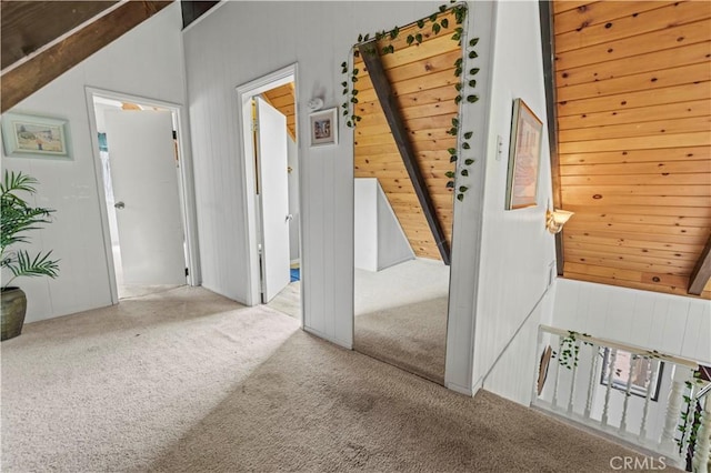 1513 Bernina Dr, Pine Mountain Club, CA 93222 - foyer entrance with carpet floors, wood walls, lofted ceiling, and wooden ceiling