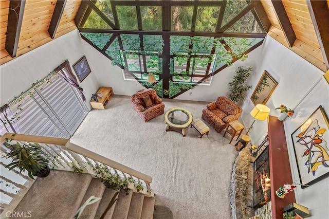 1513 Bernina Dr, Pine Mountain Club, CA 93222 - carpeted living area with wooden ceiling, beamed ceiling, high vaulted ceiling, and stairs
