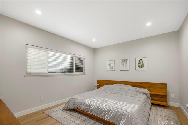 9321 Chapman Ave Unit 2, Garden Grove, CA 92841 - bedroom featuring light wood-style flooring, baseboards, and recessed lighting