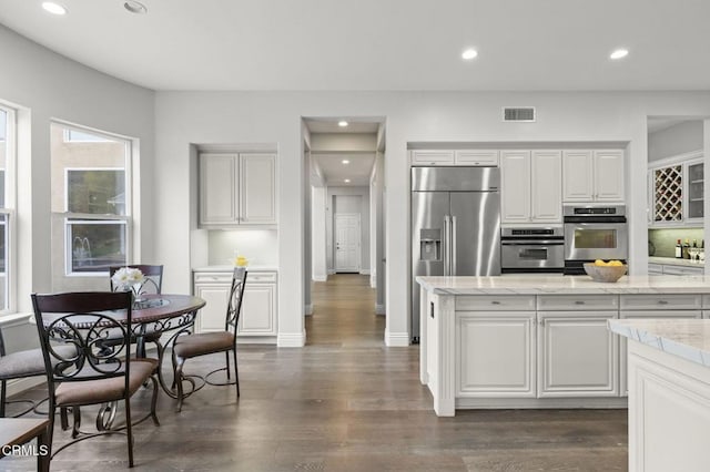 181 Via Sandra, Newbury Park, CA 91320 - kitchen with stainless steel appliances, dark wood-type flooring, recessed lighting, and white cabinetry