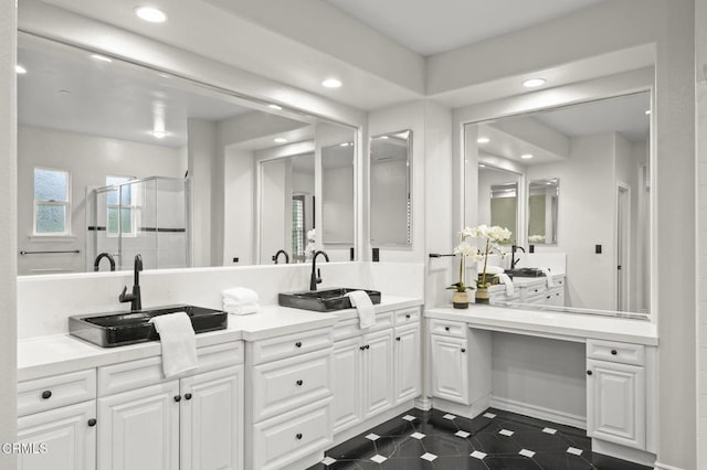 181 Via Sandra, Newbury Park, CA 91320 - full bath featuring recessed lighting, a shower stall, inlaid floor details, double vanity, and tile patterned flooring