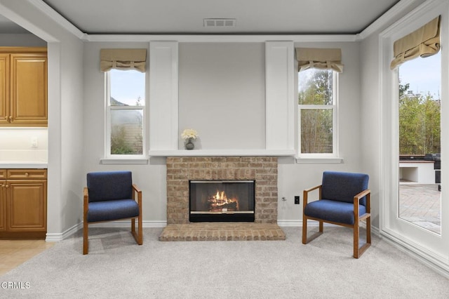 181 Via Sandra, Newbury Park, CA 91320 - sitting room featuring light carpet, a fireplace, baseboards, and ornamental molding