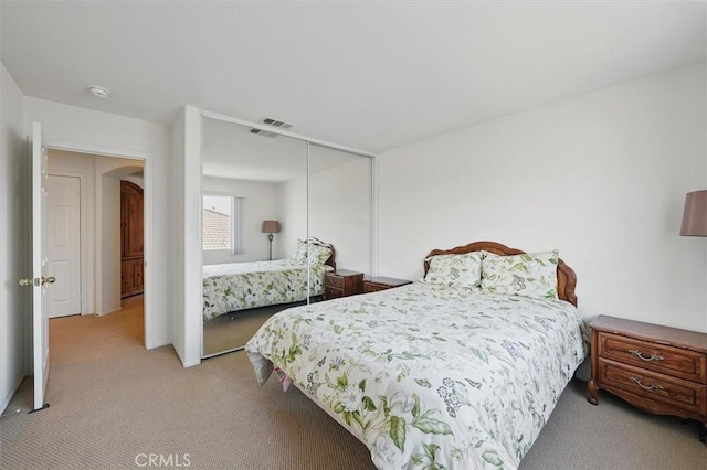 28652 Deer Springs Dr, Saugus, CA 91390 - bedroom featuring light carpet, a closet, and arched walkways