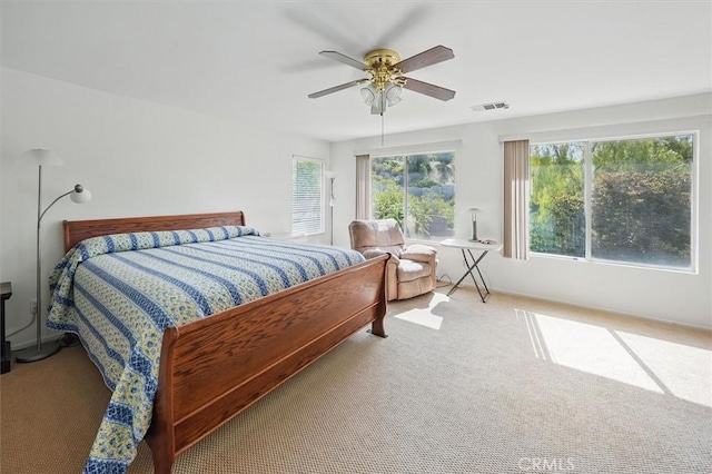 28652 Deer Springs Dr, Saugus, CA 91390 - carpeted bedroom with multiple windows and ceiling fan