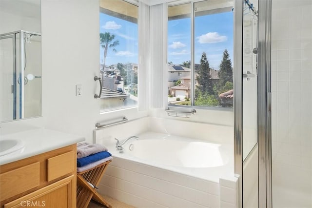 28652 Deer Springs Dr, Saugus, CA 91390 - full bathroom featuring a stall shower, a garden tub, and vanity