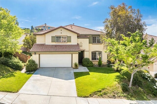 28652 Deer Springs Dr, Saugus, CA 91390 - view of front facade featuring stucco siding, concrete driveway, a tile roof, and a garage