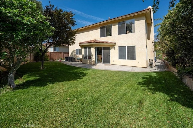 28652 Deer Springs Dr, Saugus, CA 91390 - rear view of house featuring stucco siding, a patio area, a tile roof, and central air condition unit