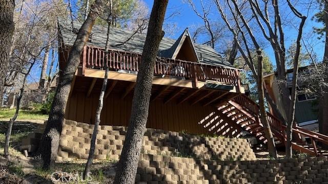 32903 Canyon Dr, Green Valley Lake, CA 92341 - view of side of property with a wooden deck and board and batten siding